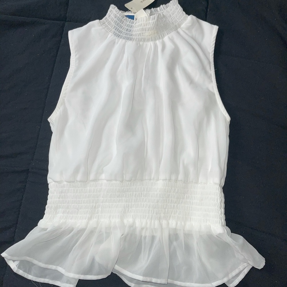 Sleeveless white blouse